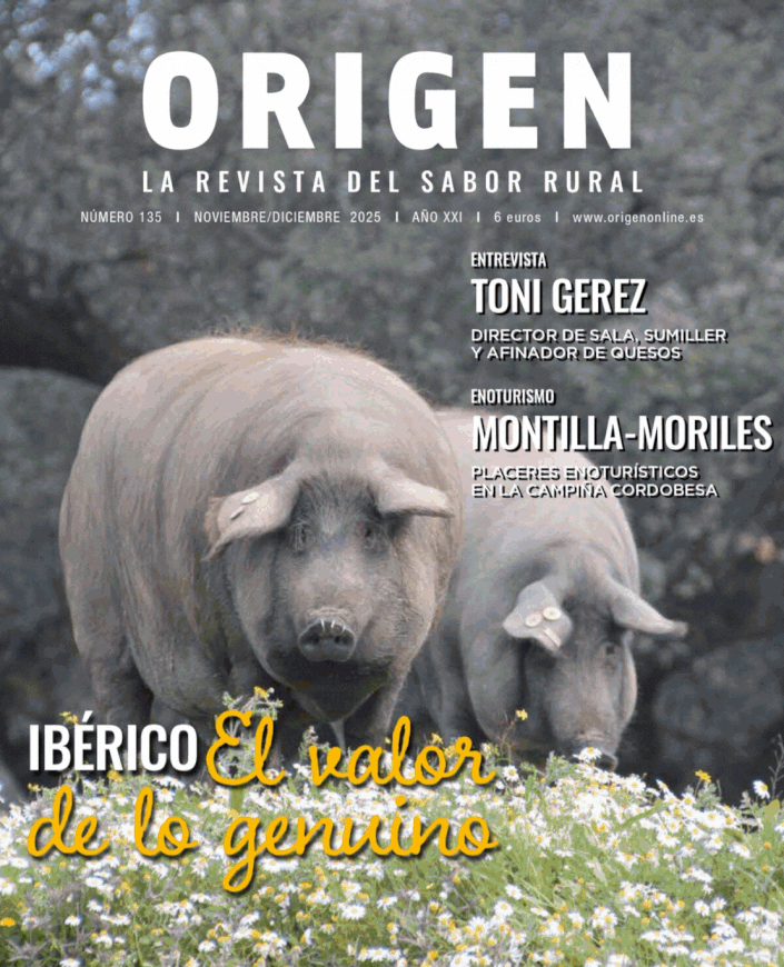 Portada de la revista Origen con cerdos ibéricos y flores