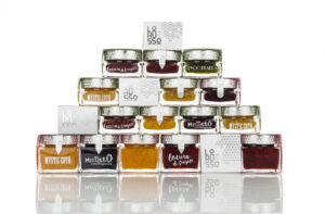 Variedad de mermeladas artesanas de la marca Lorusso en frascos elegantes.