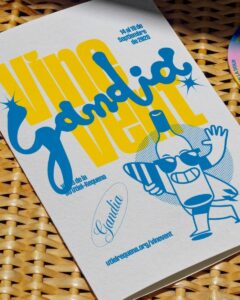 Cartel del evento Vinevent en Gandía con diseño colorido y detalles de vino.